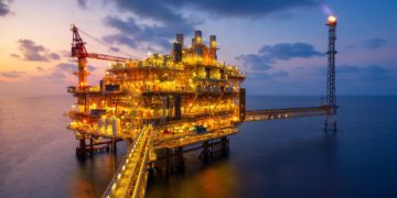 Business: Oil price slide continues