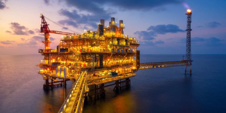 Business: Oil price slide continues