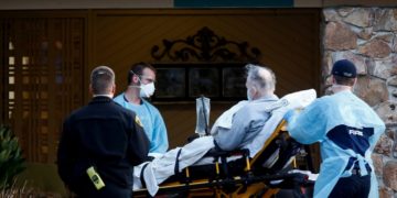 US coronavirus deaths pass bleak 10,000 milestone