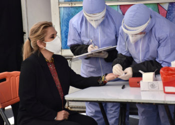 Bolivia's interim president tests positive for COVID-19