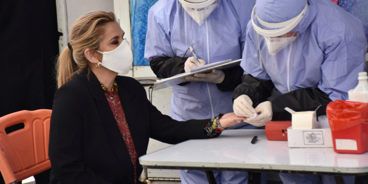 Bolivia's interim president tests positive for COVID-19