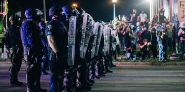 Black man's shooting sparks civil rights probe