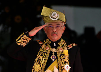 Malaysian king calls for end of 'politicking' COVID-19 fight