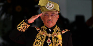 Malaysian king calls for end of 'politicking' COVID-19 fight