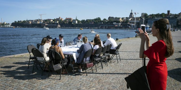 Sweden continues to reject masks as Covid-19 cases soar and ICU beds fill up