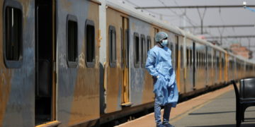 South Africa loosens COVID curbs as third wave eases