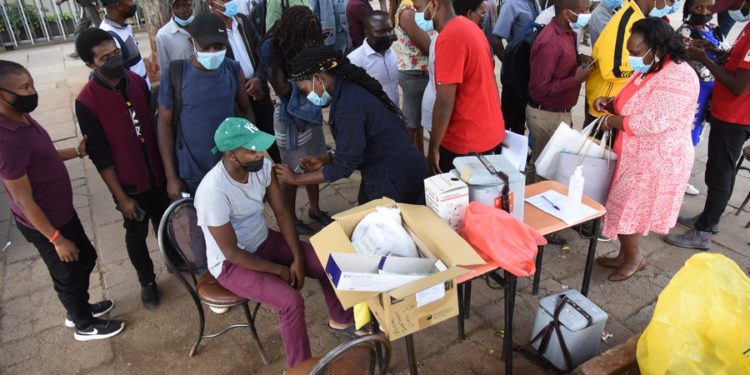 COVID-19 vaccines may need to be updated to provide continued protection against emerging variants -- WHO