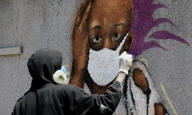 Senegal's graffiti artists join fight against coronavirus