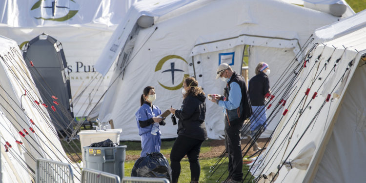 US virus deaths pass 5,000