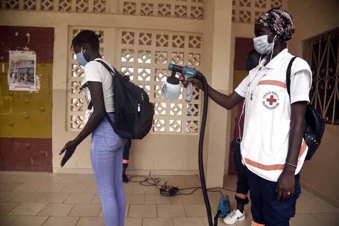 Senegal's quiet COVID success: Test results in 24 hours, temperature checks at every store, no fights over masks