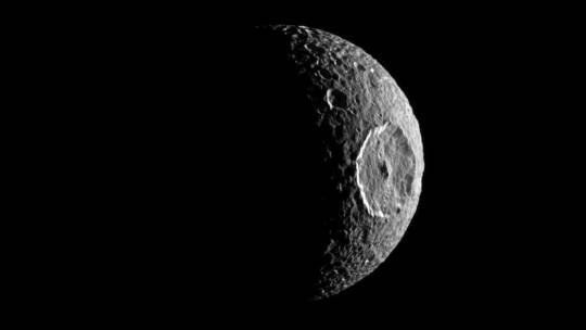 Saturn’s moon of Mimas is likely hiding an ocean under its surface where alien life could be found: scientists